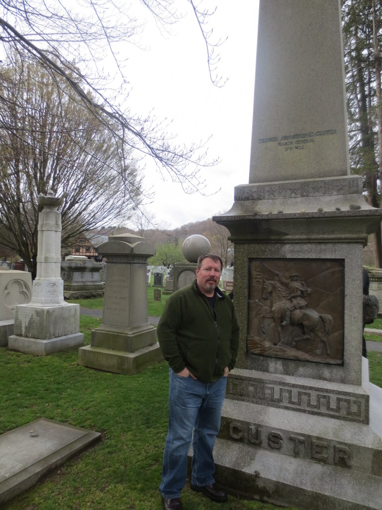 Brian Turner at Custer's grave, West Point Cemetery, New York.